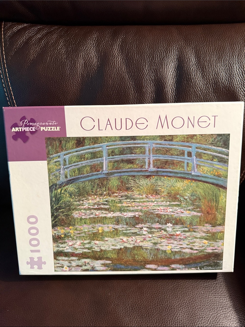 Pomegranate Claude Monet the Japanese footbridge jigsaw puzzle 1000 pieces.